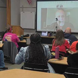 uaw region 8 conference class watching a video